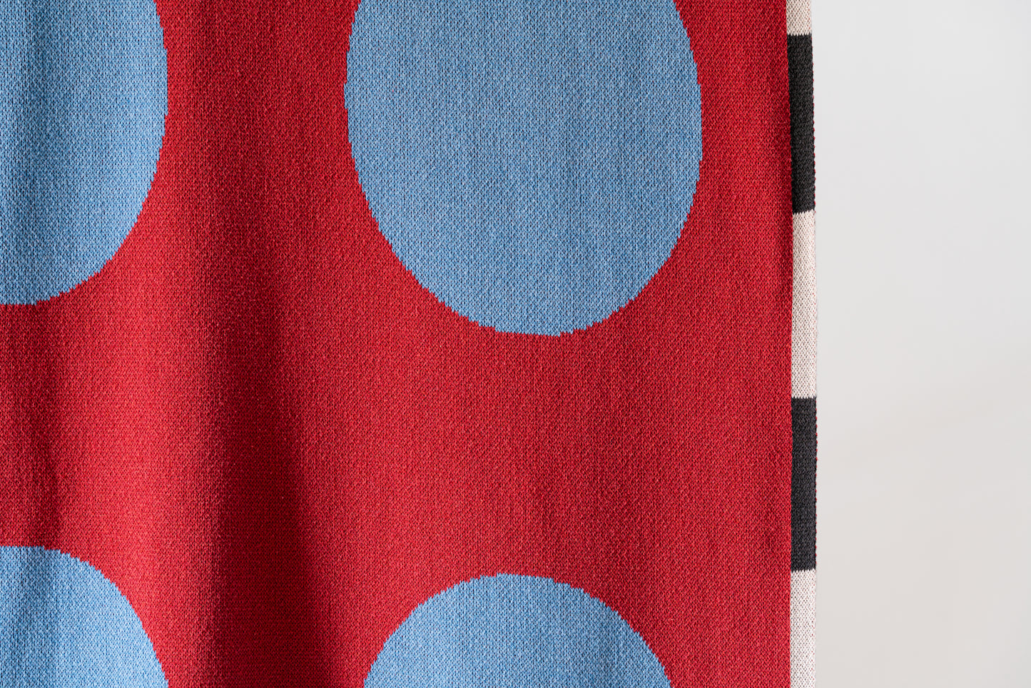 Red and blue polka dot throw blanket