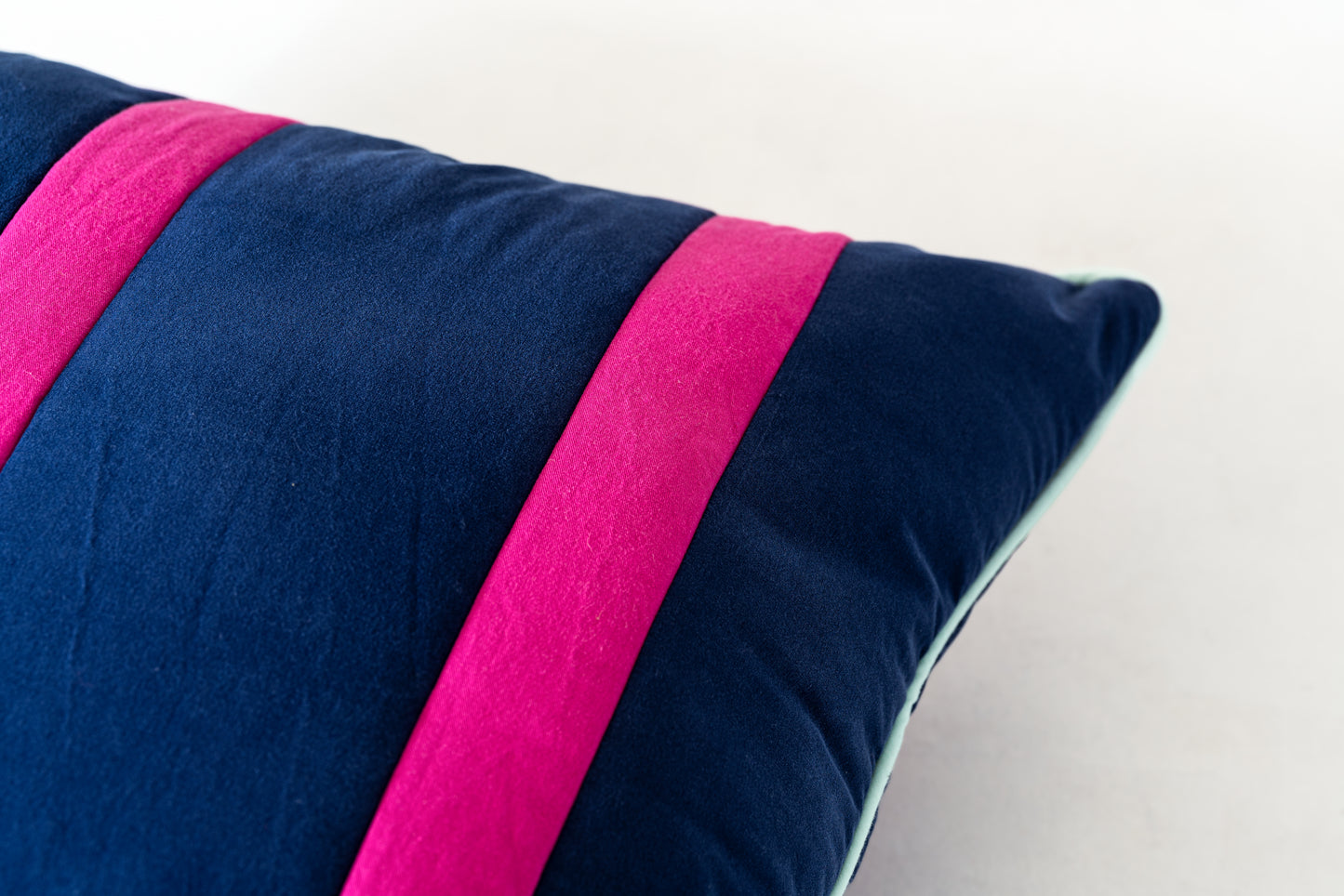 Dark blue and pink strips throw pillow