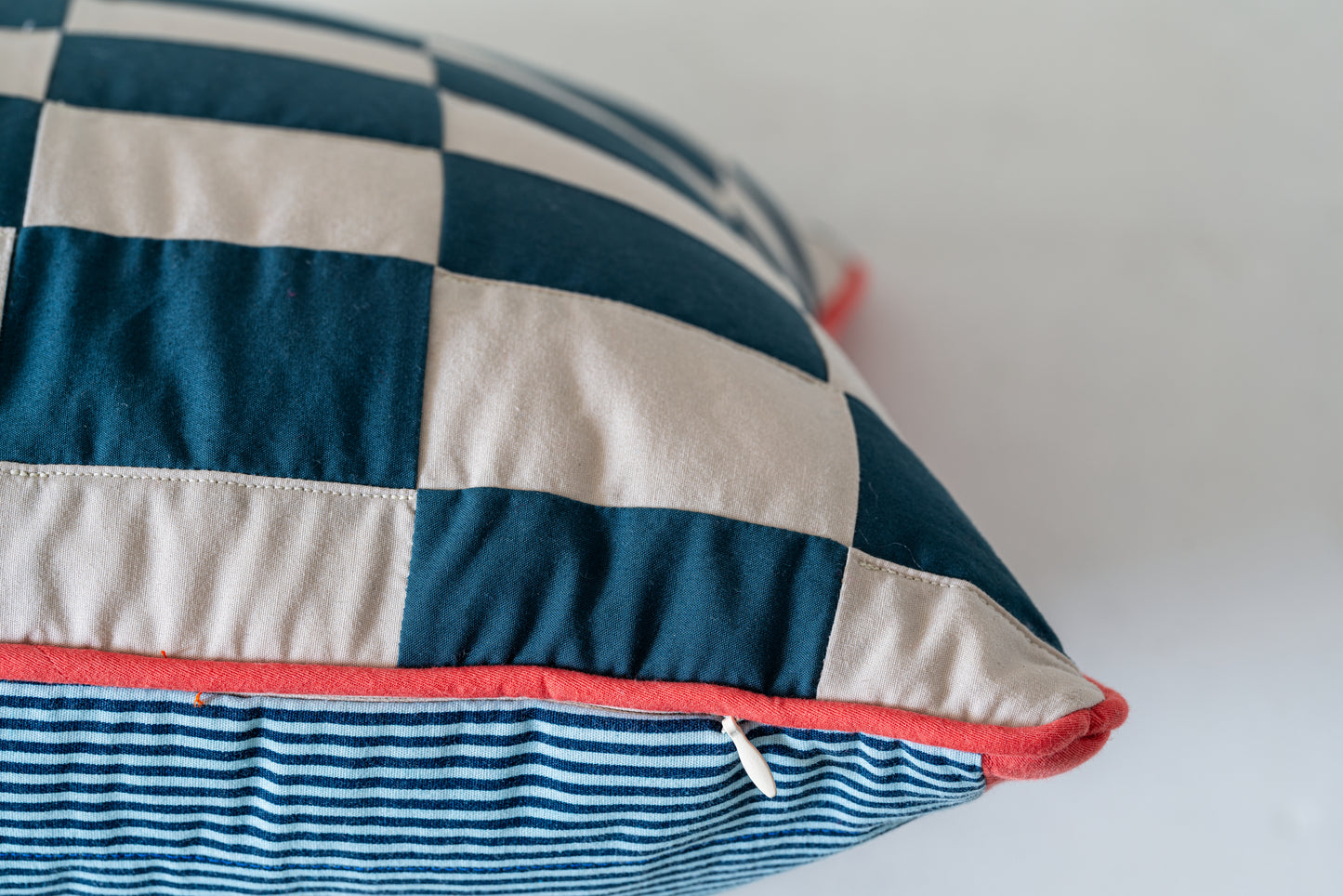 Checker blue and cream pillow