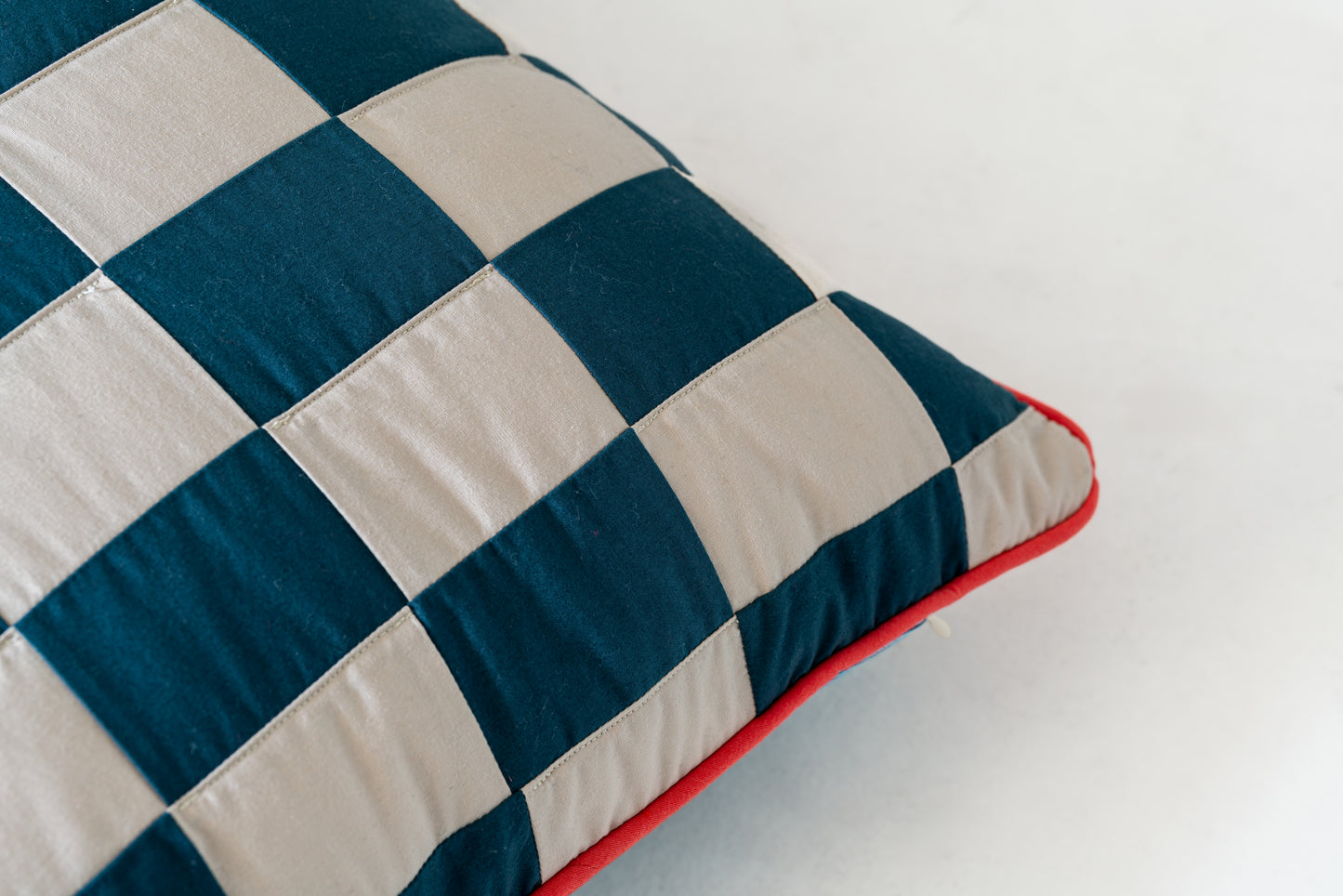 Checker blue and cream pillow